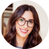 Home Woman with glasses smiles