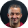 Man with graying hair smiling
